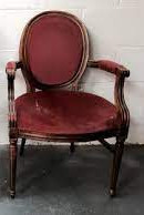 French armchair with an oval back and faded rose velvet